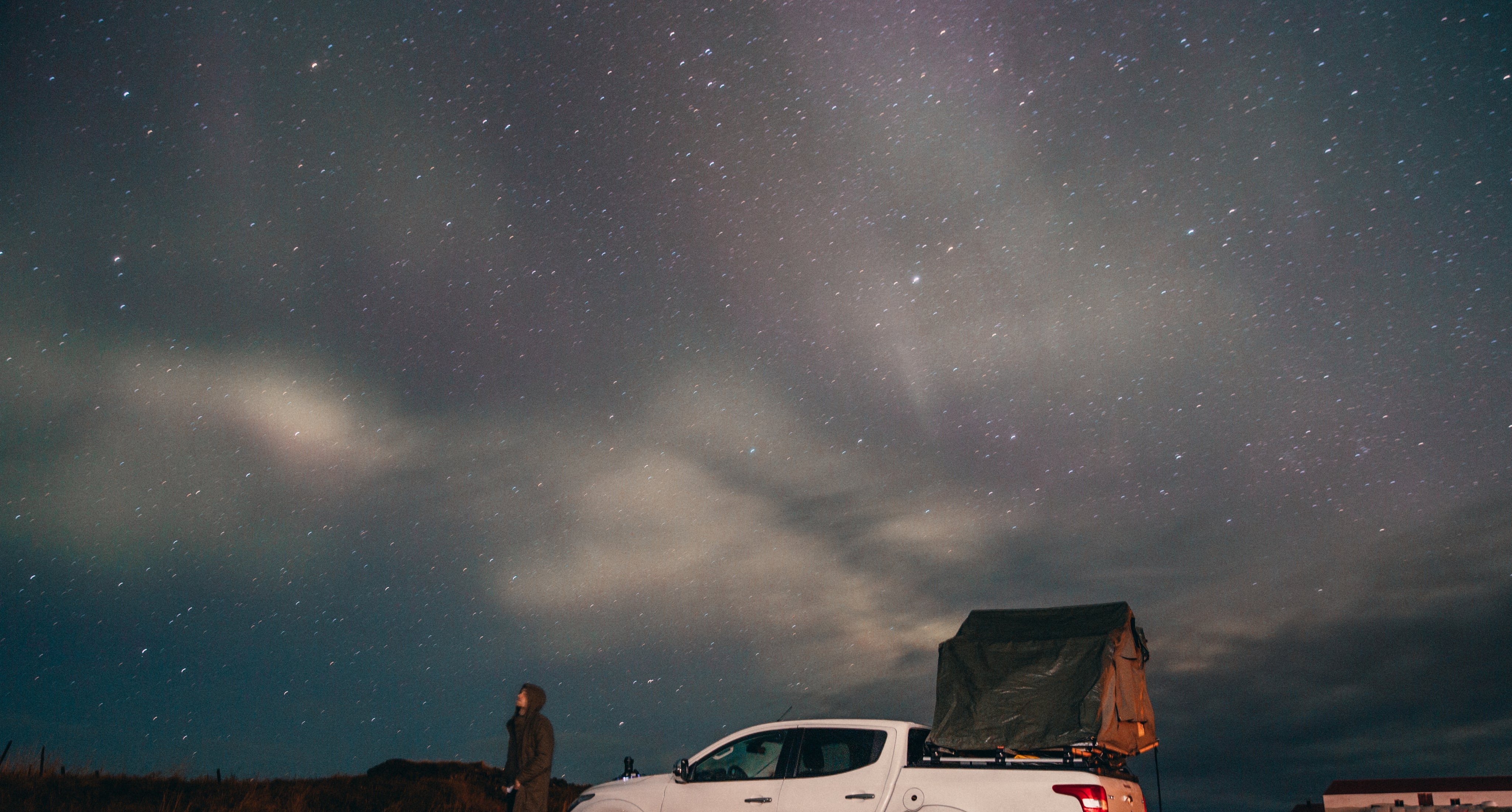 camping-under-stars-northern-lights